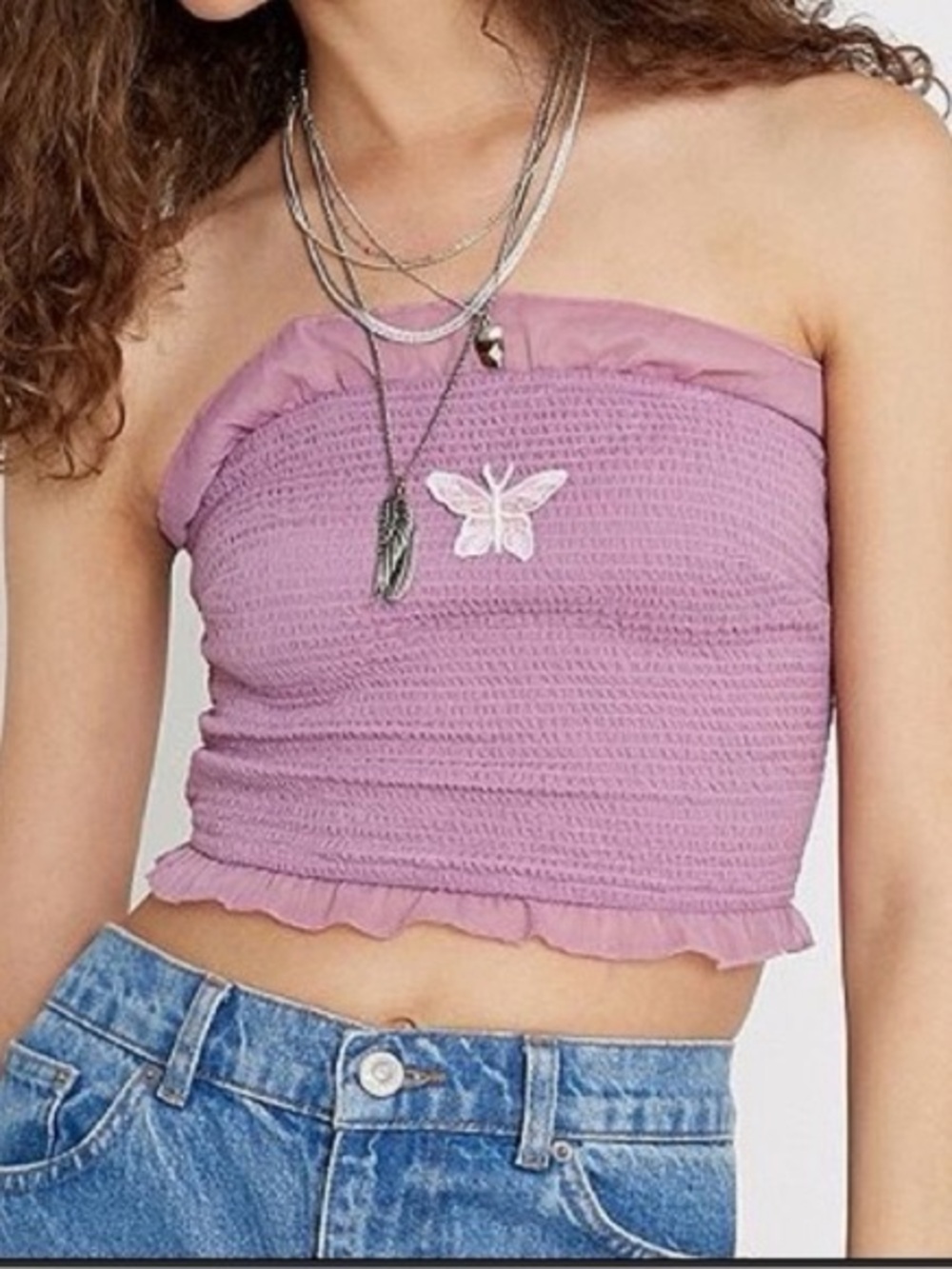 Urban Outfitters Leo smocked tube top featuring a charming embroidered butterfly